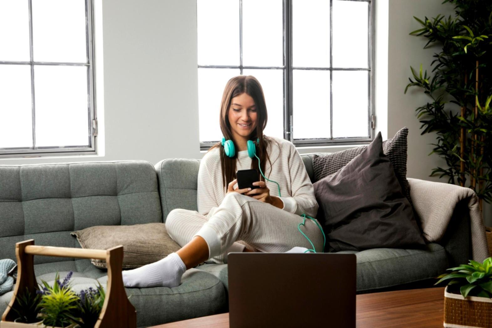 Financial planning workspace with documents and laptop